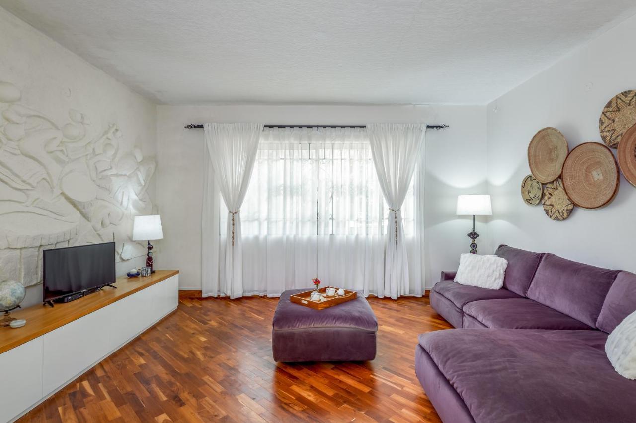 カンパラ Ewange - A Casa Mia Bed & Breakfast エクステリア 写真