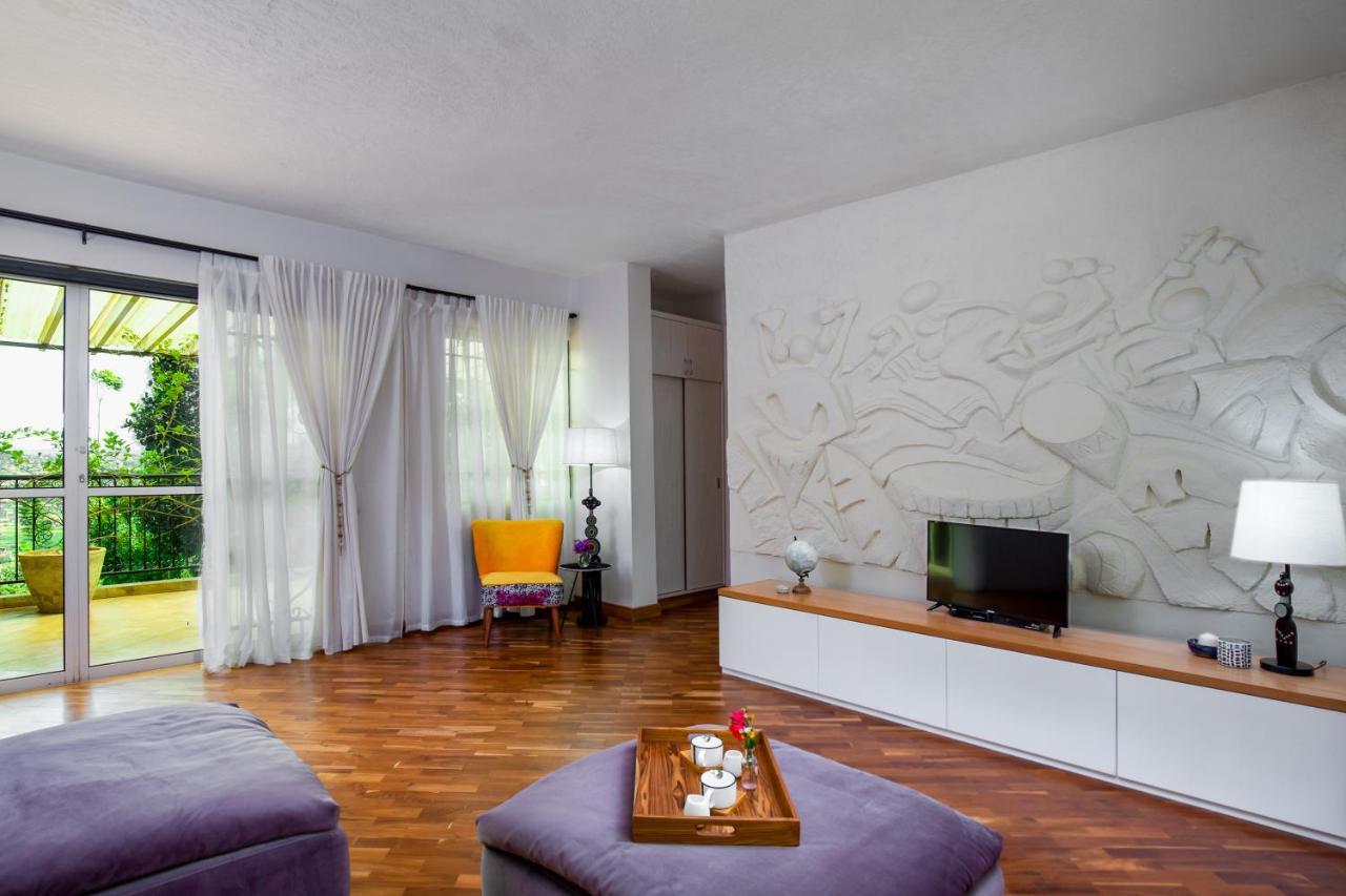 カンパラ Ewange - A Casa Mia Bed & Breakfast エクステリア 写真